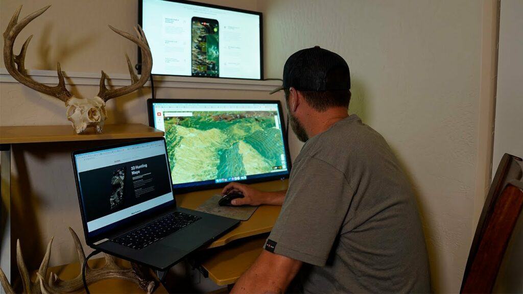 Hunter at his desktop computer compiling all of his scouting data to analyze his best opportunities for success.