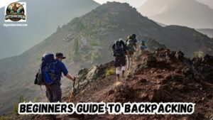 Beginners Guide to Backpacking featured image showing a group of three backpackers hiking up a mountain trail.