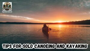 Tips for Solo Canoeing and Kayaking featured image showing a lone paddler in a canoe in the middle of a lake at sunrise.