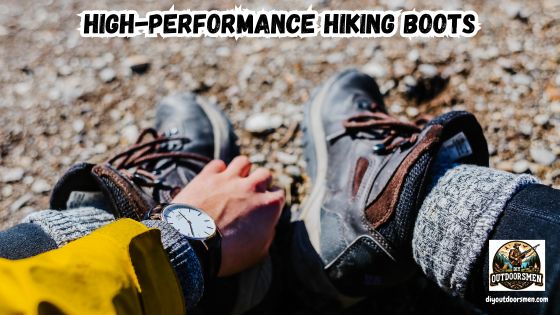 High-Performance Hiking Boots featured image showing a hiker sitting down and adjusting his hiking boots.