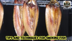 The Art of Smoking Fish featured image showing several fish hanging in a smoker.