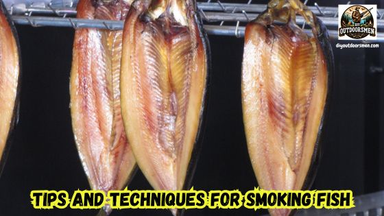 The Art of Smoking Fish featured image showing several fish hanging in a smoker.