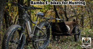 Rambo E-bikes for Hunting featured image showing the Rambo Hunting E-Bike pulling the game cart accessory loaded with a nice whitetail buck.