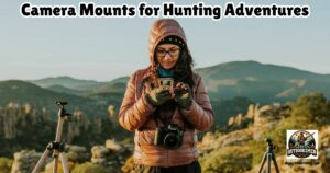 Camera Mounts for Hunting Adventures featured image showing a lady on a hill with mountains in the background, two tripod camera mounts, and a camera around her neck.