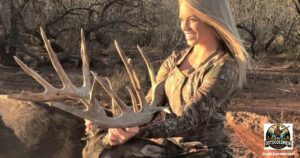 DIY Hunting Trips for Weekend warriors featured image showing young lady hunter with a very nice whitetail buck.
